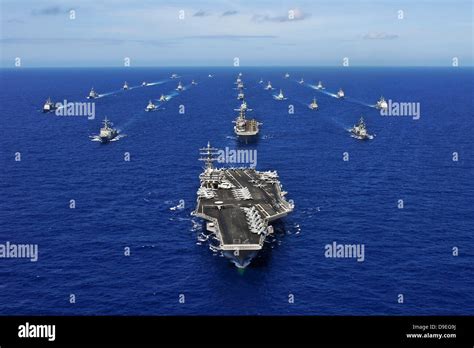 Fleet multinational navy ships transit hi-res stock photography and ...