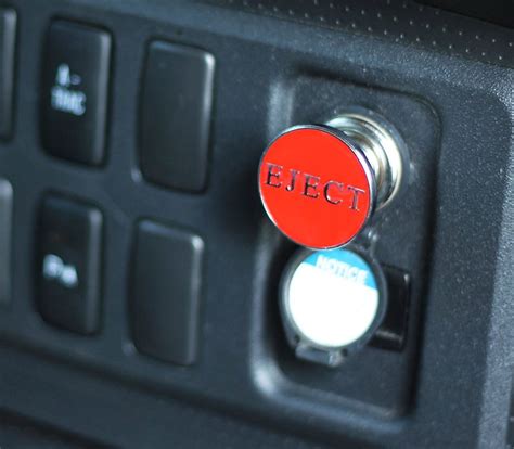 Fake Eject Button For Your Car - Fits Into Your Cigarette Lighter