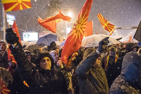 Nationalists burn Greek flags outside FYROM Parliament (photos ...