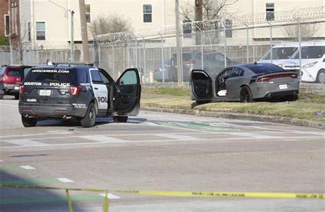 Police: Suspect in custody after wounding 3 Houston officers | AP News