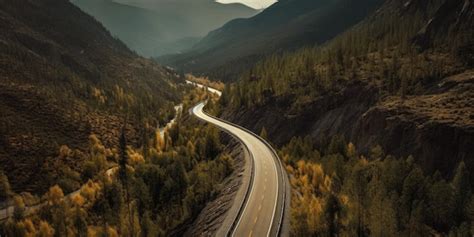 Premium AI Image | aerial view of a road in the mountains