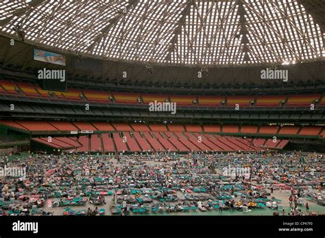 Thousands of Hurricane Katrina survivors from New Orleans were bused to a Red Cross shelter in ...