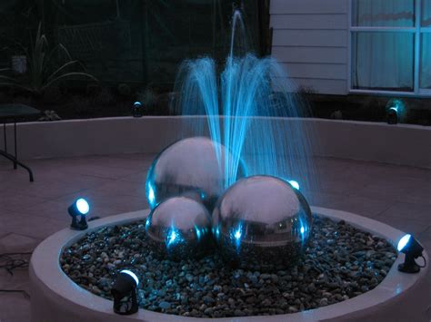 LED lighting on a backyard water feature #led #lights #waterfeature | Pond lights, Water feature ...