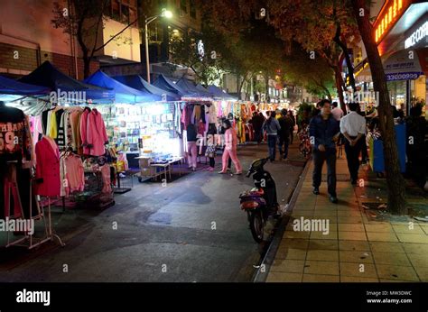 SHENZHEN, CHINA - APRIL 3: night market in Futian district, Huanggang ...