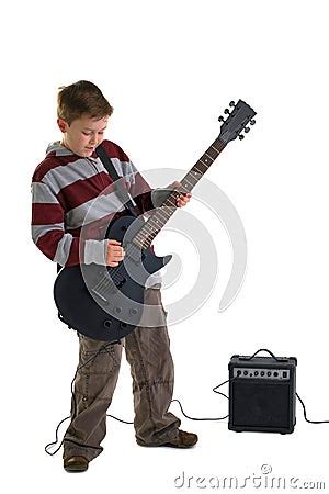 Boy Playing An Electric Guitar Isolated Stock Image - Image: 7542981