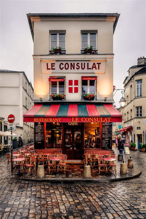 Le Consulat in Montmartre on a rainy day in Paris | Paris travel, Paris ...