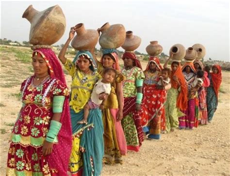 Pakistan Sindh women wearing traditional colourful dress in Thar desert ...