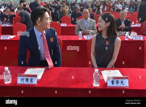 Richard Liu Qiangdong, left, Chairman and CEO of JD.com, and his wife Zhang Zetian, also known ...