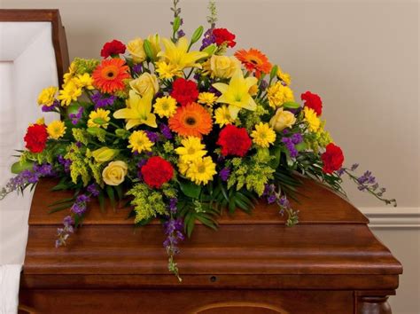 Mixed Bold Colors Casket Spray | Albuquerque (NM) Funeral Flowers ...