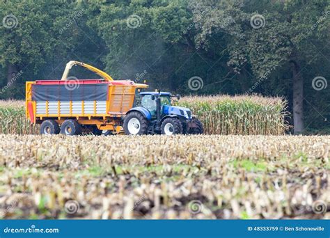 Farmer on Tractor Harvesting Corn Stock Image - Image of autumn ...