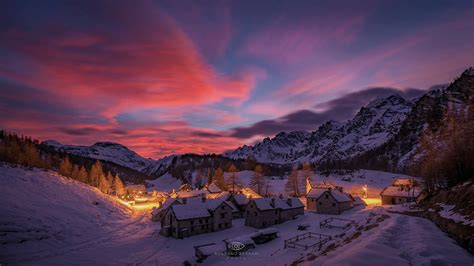 Download Light Night Village House Snow Mountain Photography Winter HD Wallpaper by Rossano Ferrari