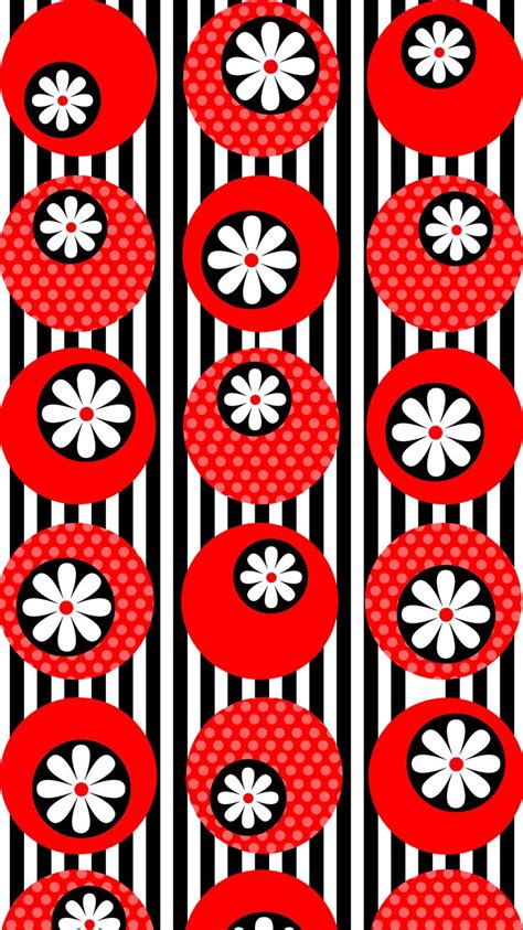 a red and black striped background with white flowers on the top of ...