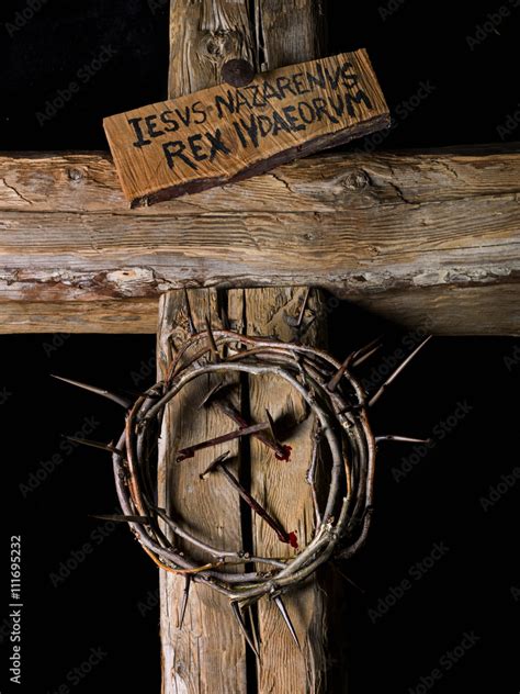 Crown of thorns and nails of Christ with blood on wooden cross Stock Photo | Adobe Stock