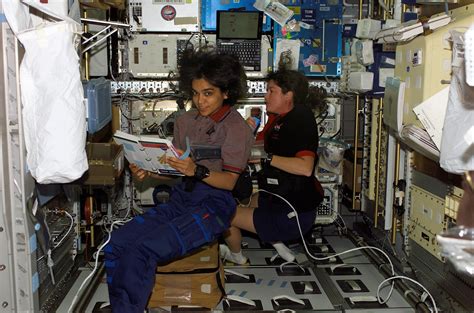 Astronauts Kalpana Chawla and Laurel Clark, STS-107 mission specialists ...