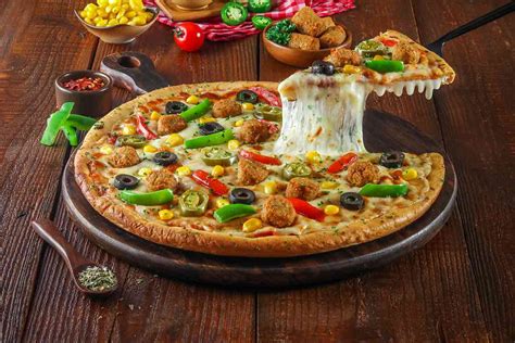 Order Veg Falafel Supreme Pizza Cheese Burst Pizza Medium from ...