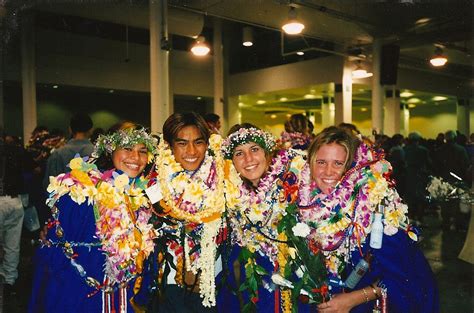 High school graduation in Hawaii...stacks of leis on practically all of the graduates ...