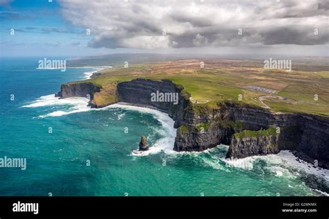 Aerial view, Cliffs of Moher, O'Brian's Tower, Lookout Tower on the Cliffs of Moher, rocky ...