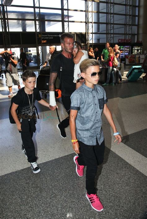 David Beckham with his kids Cruz, Romeo and Harper at LAX - Growing ...