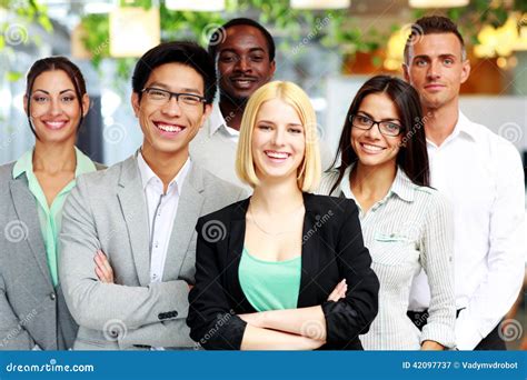 Happy group of co-workers stock image. Image of cheerful - 42097737