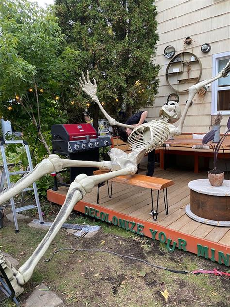 This Couple Went Viral for 'Growing' A Halloween Skeleton in Their Garden