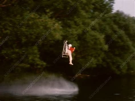 Jet pack test flights over countryside, 1960s - Stock Video Clip - K005/8520 - Science Photo Library