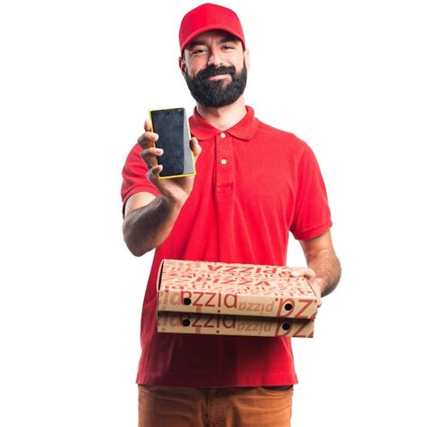 Free Photo | Pizza delivery man holding a mobile