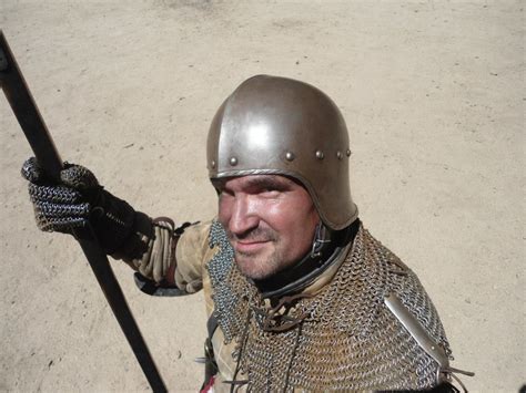 Knight cooking in the sun. | Arm armor, Riding helmets, Medieval armor