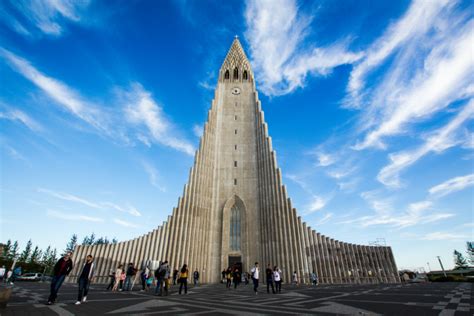 People walking into Hallgrimskirkja Church in Reykjavik cruise port in Iceland