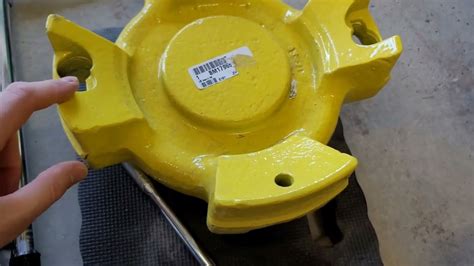 John Deere 60 lbs. steel rear wheel weights install on a 2520. Part ...