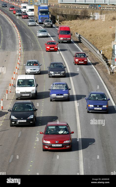 Heavy traffic on the m6 motorway driving through a contraflow system in the uk Stock Photo - Alamy