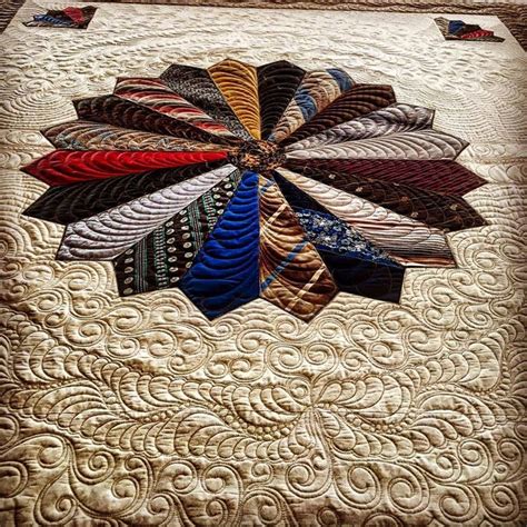 Quilt made from a loved ones ties. May have to dig up grandpa's old ties and get to work ...