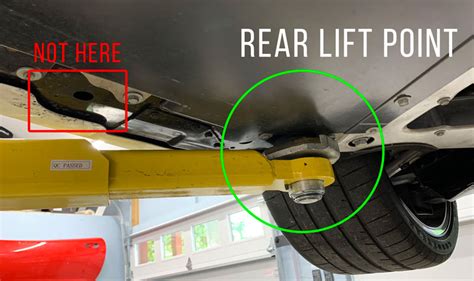 The correct REAR lifting points for the C8 Corvette are located just in front of the rear wheels.