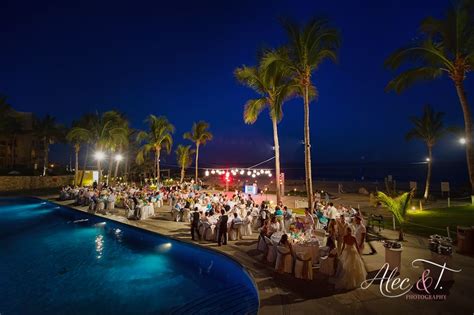 A poolside reception looks stunning even after the sun goes down # ...