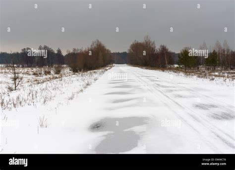 Winter landscape with country road in central Ukraine Stock Photo - Alamy