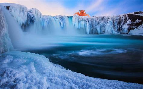 A frozen waterfall in Iceland. [1920x1200] : r/wallpaper