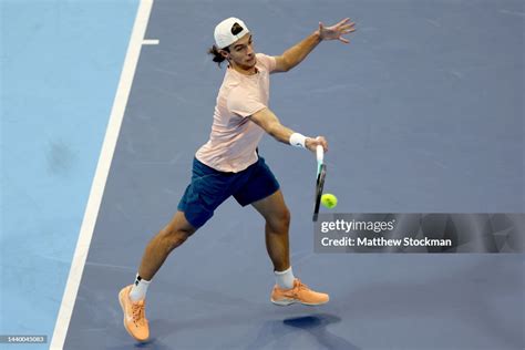 Lorenzo Musetti of Italy returns a shot to Chun-Hsin Tseng of Chinese ...