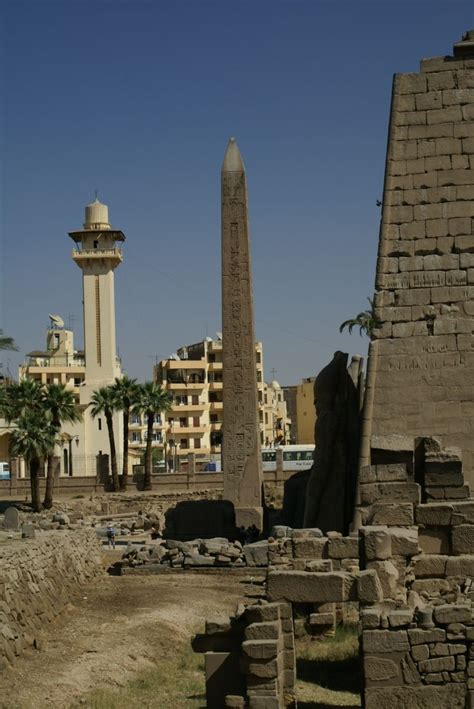 An Obelisk Within Luxor Temple With The Luxor Mosque in The Background ...