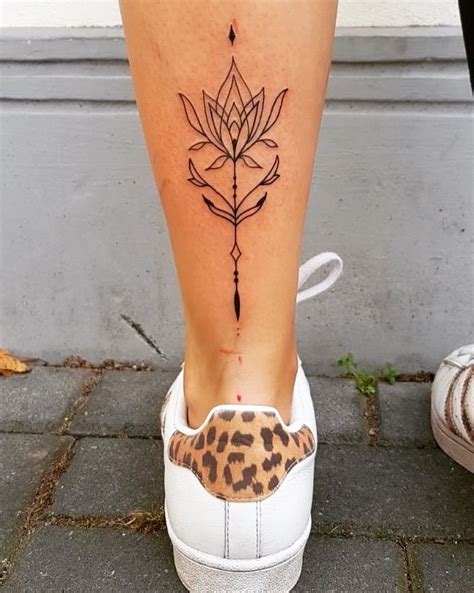 Symmetry ink lower leg tattoo | Calf tattoos for women, Lower leg ...