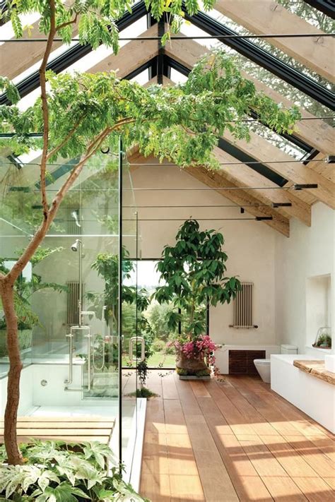 A ridge skylight floods the master bath with light. Sunlight plays up the soft finishes of ...