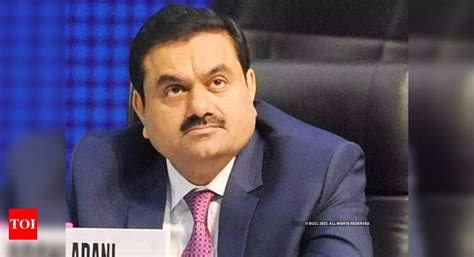 Fresh troubles see Adani stocks cap worst month since February - Times of India