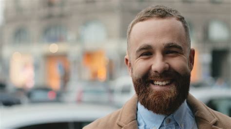 Free stock video - Portrait of happy caucasian businessman with a beard smiling to the camera ...