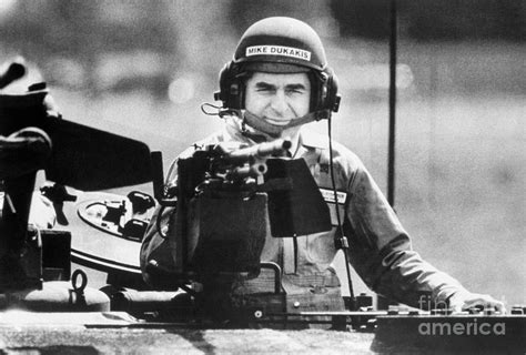 Michael Dukakis Riding In A Tank by Bettmann