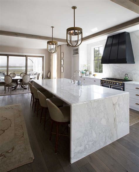 Check out this image from The Urban Electric Co. | Kitchen island design, Waterfall countertop ...