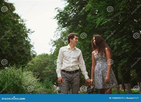 Beautiful Young Couple on a Nature Background Stock Image - Image of girlfriend, nature: 104843519