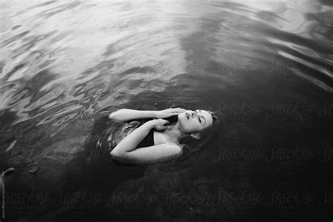 Girl Floating In Water Photography