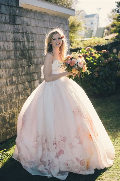 a watercolor theme carried through to the Bride's painted dress Photography: Katie Slater ...