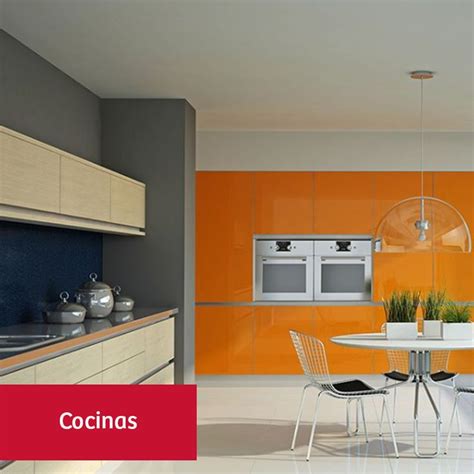 a modern kitchen with orange and white walls
