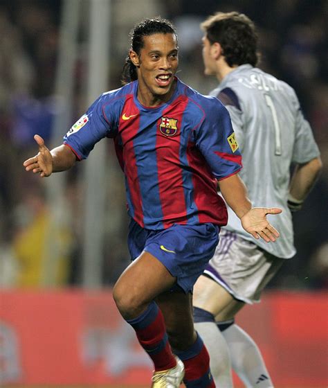 BARCELONA, SPAIN - NOVEMBER 20: Barcelona's Ronaldinho reacts after scoring a goal against Real ...