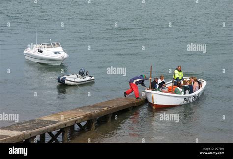 Passengers on the Piel Island ferry, South Lakeland, Cumbria, England ...