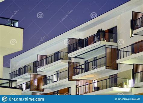 Exterior of Apartment Building at Night Stock Image - Image of flats, house: 141477765